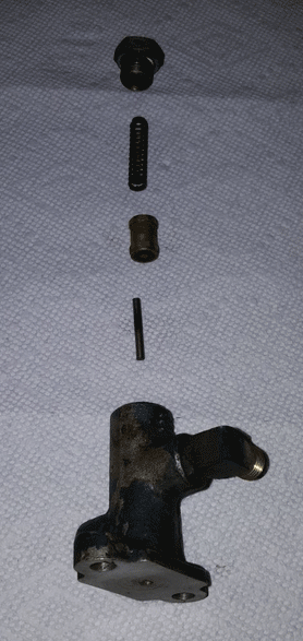 Disassembled compressor unloader valve